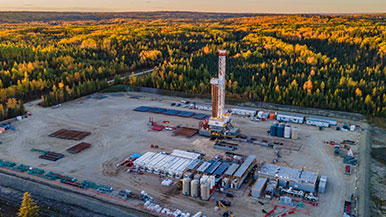 Aerial photo of a drilling rig in the Kaybob Duvernay region