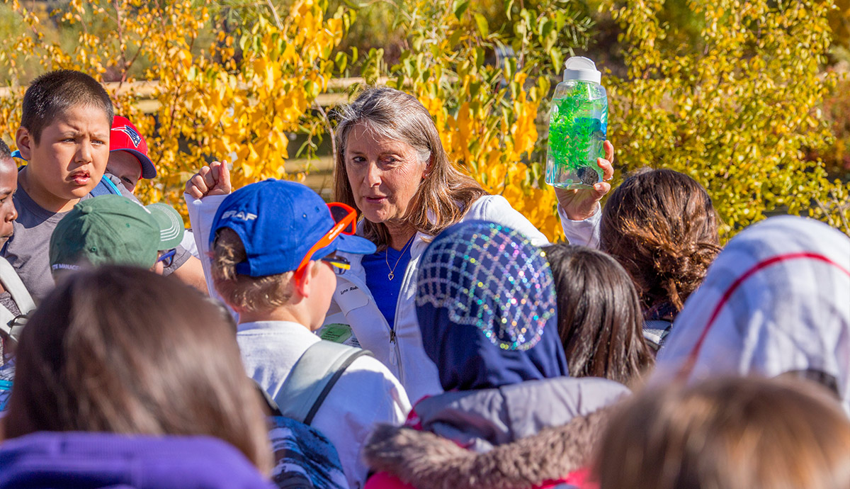 Teacher talking to students at Chevron Learning Pathway