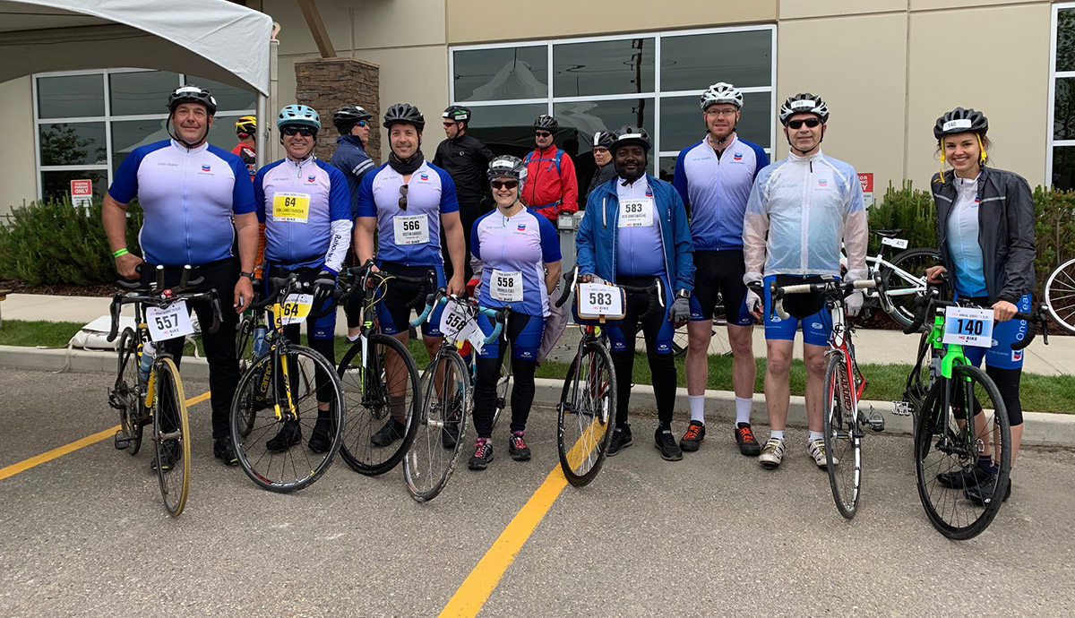 Members of the Chevron One Team pose before starting the MS Bike charity ride