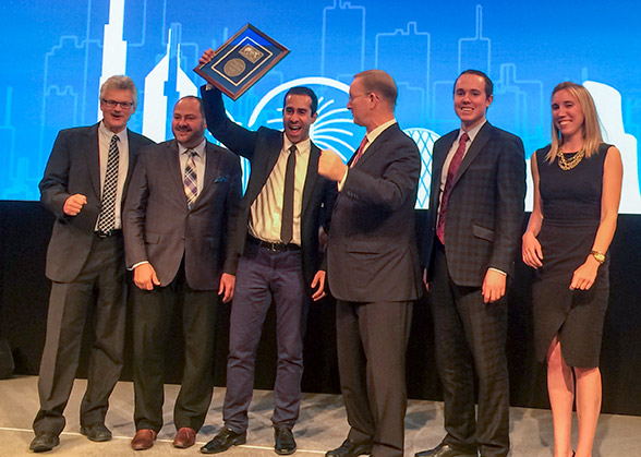 Ramez Hanna Alla (center) accepts the 2016 President’s Award for Section Excellence at the Society of Petroleum Engineers annual technical conference and exhibition in Dubai on Sept. 28.