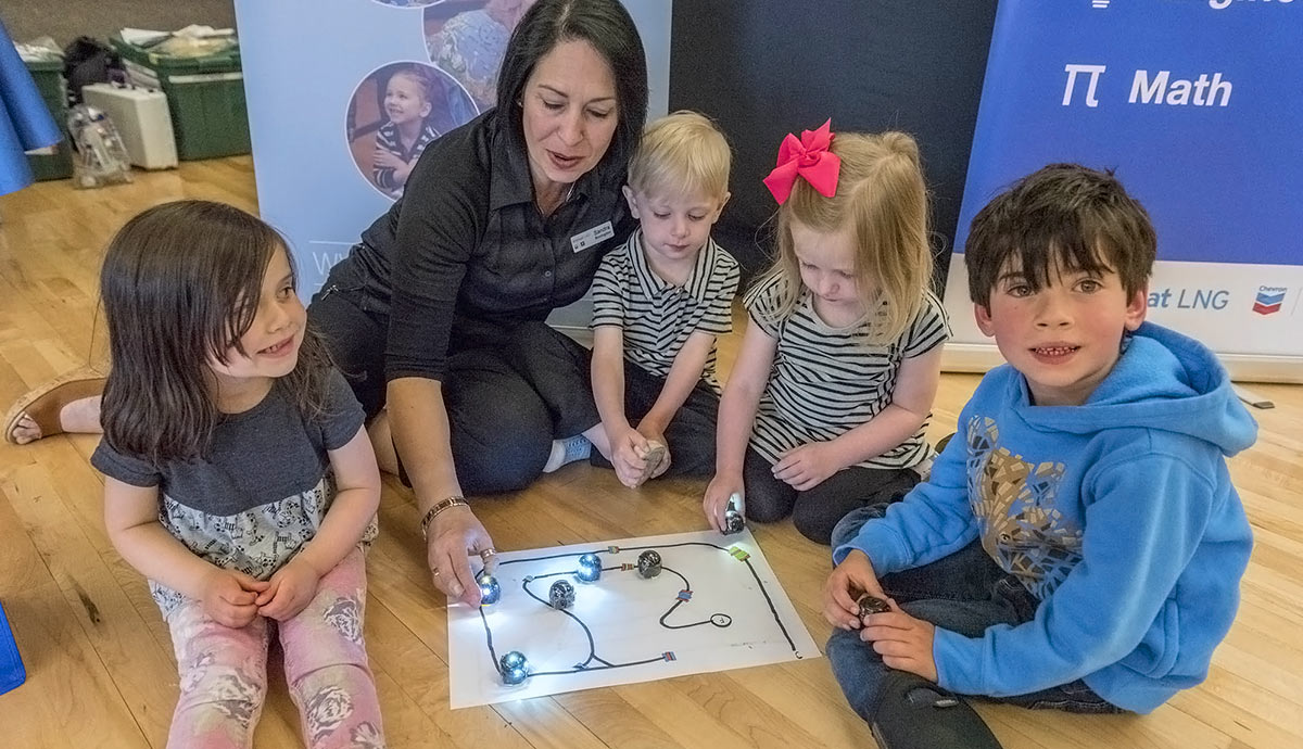 Chevron employee demonstrates robotic toy