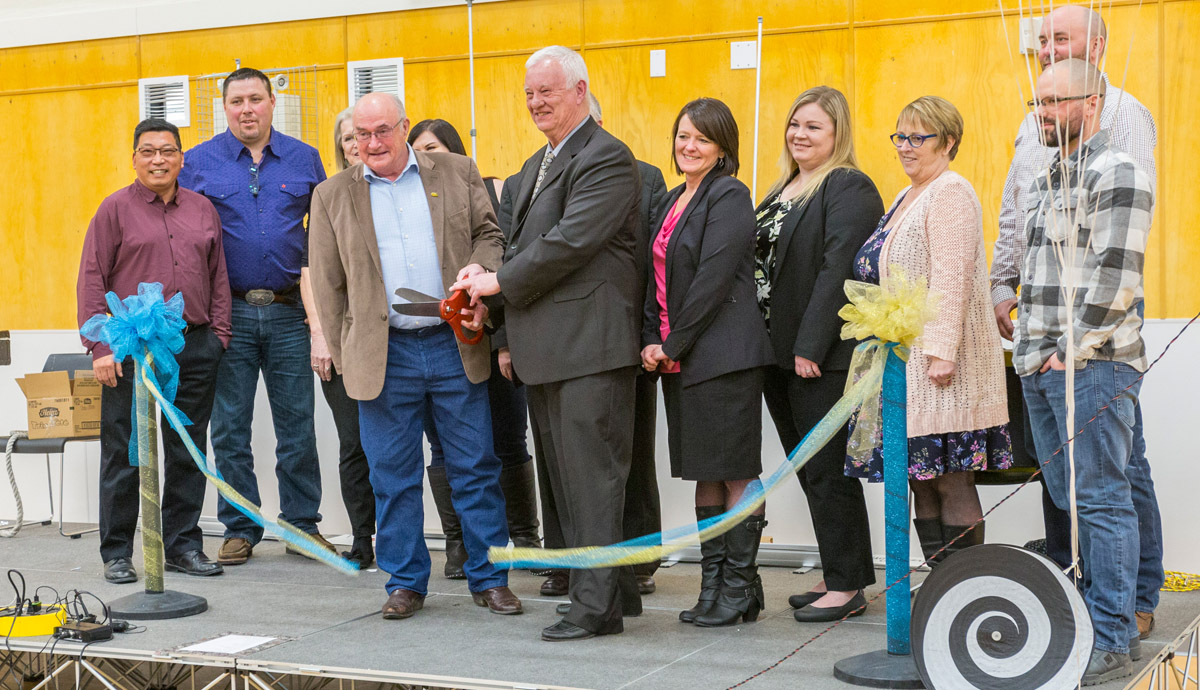 M.D. of Greenview Reeve Dale Gervais (left) and Town of Fox Creek Mayor Jim Hailes cut the ribbon to officially open the Fox Creek Greenview Multiplex.