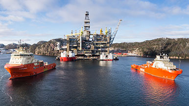 The Hebron platform being towed away from Newfoundland