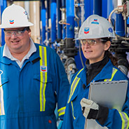 Two Chevron employees in safety gear